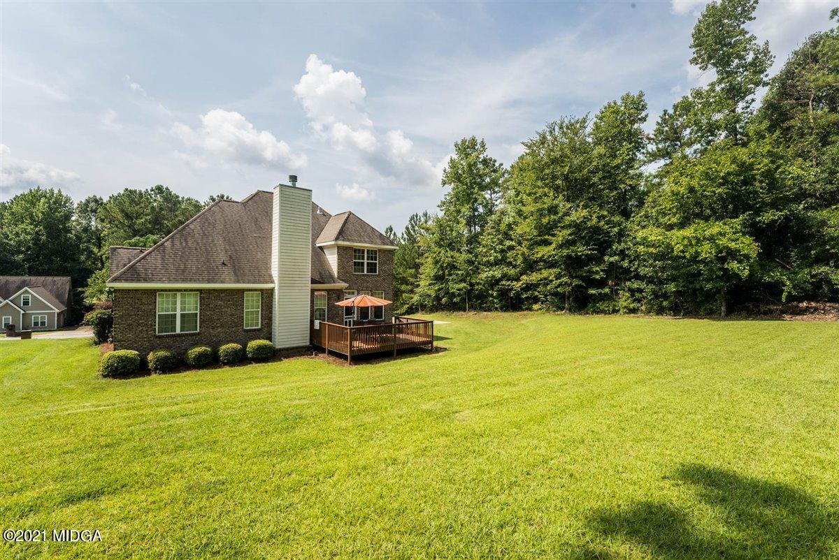 224 Carsons Walk Macon, GA 31206 - Photo 33 of 41 a view of house with yard and car parked