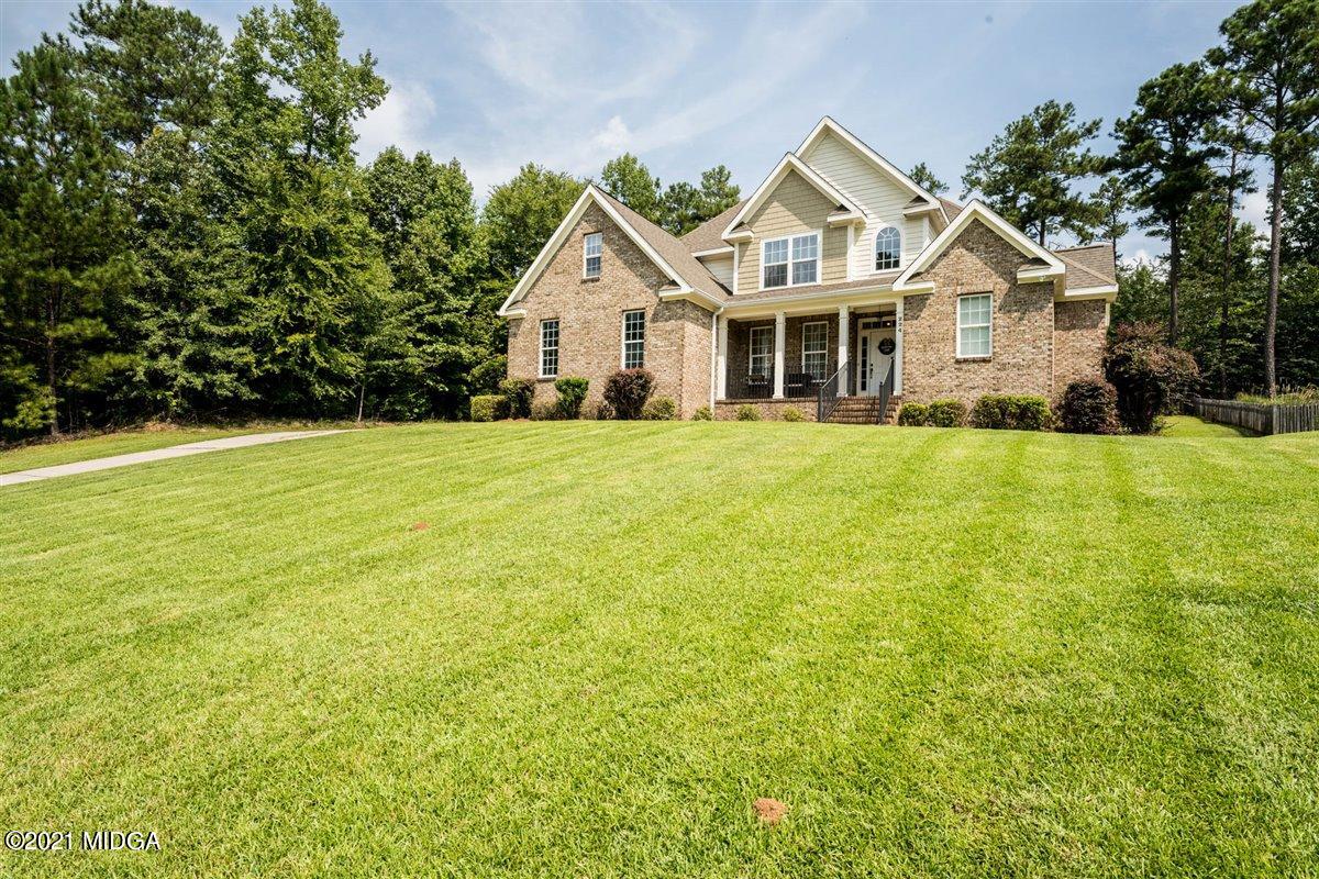 224 Carsons Walk Macon, GA 31206 - Photo 36 of 41 a front view of a house with a garden