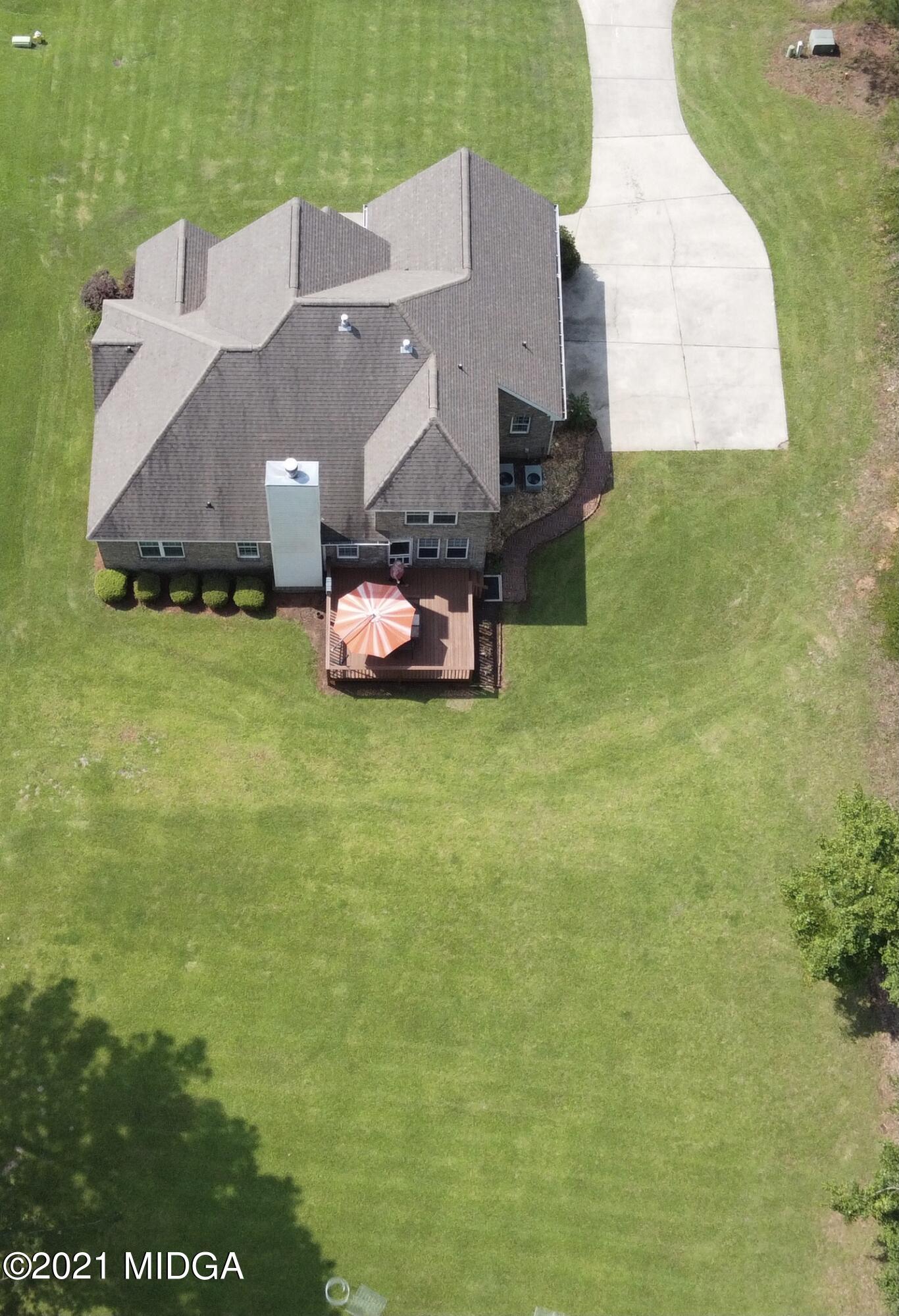 224 Carsons Walk Macon, GA 31206 - Photo 38 of 41 an aerial view of a house with a garden and swimming pool