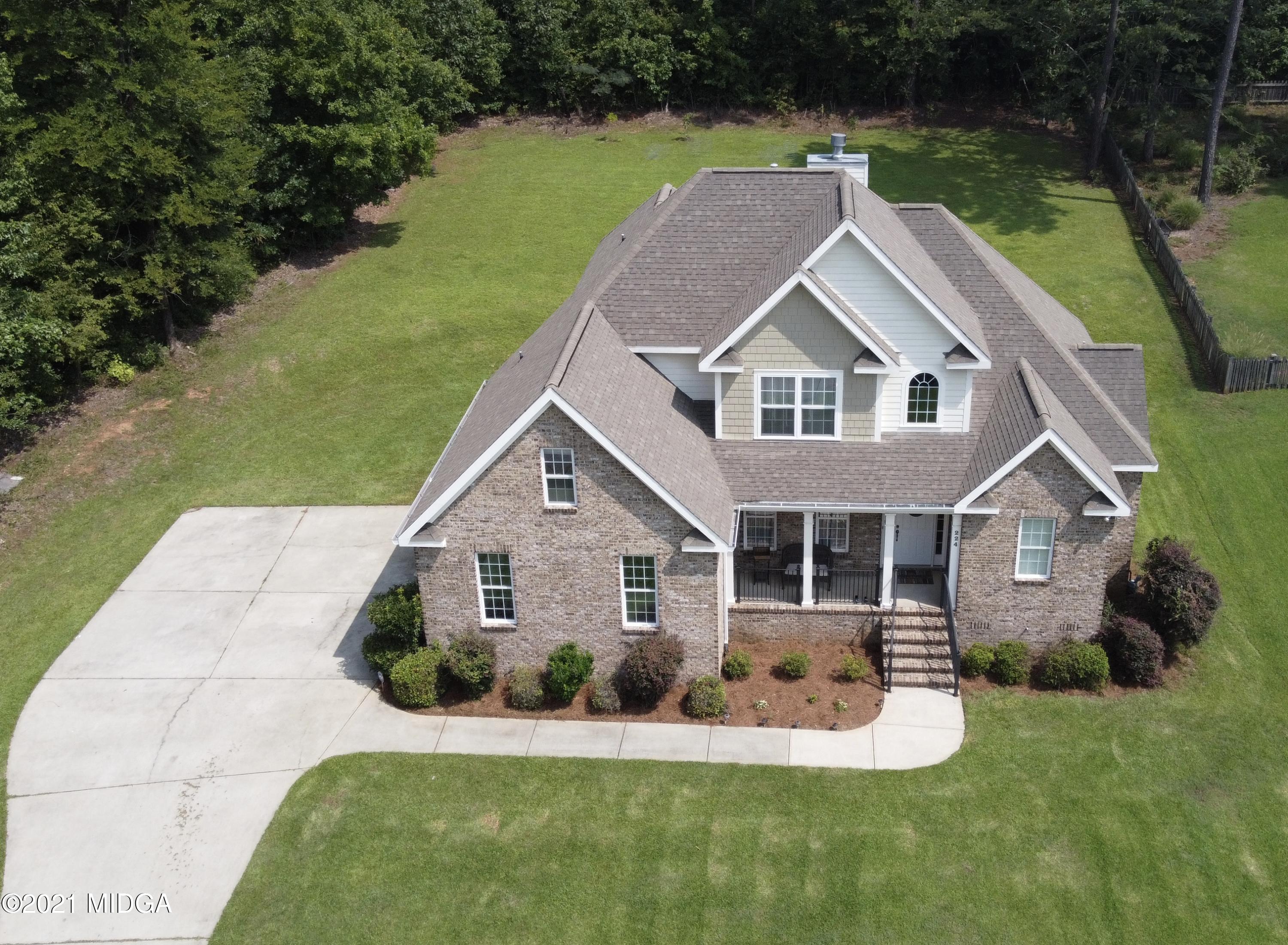224 Carsons Walk Macon, GA 31206 - Photo 39 of 41 a aerial view of a house with a yard table and chairs