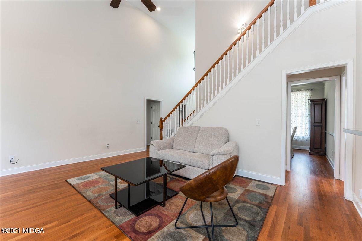 224 Carsons Walk Macon, GA 31206 - Photo 9 of 41 a living room with couches and a rug
