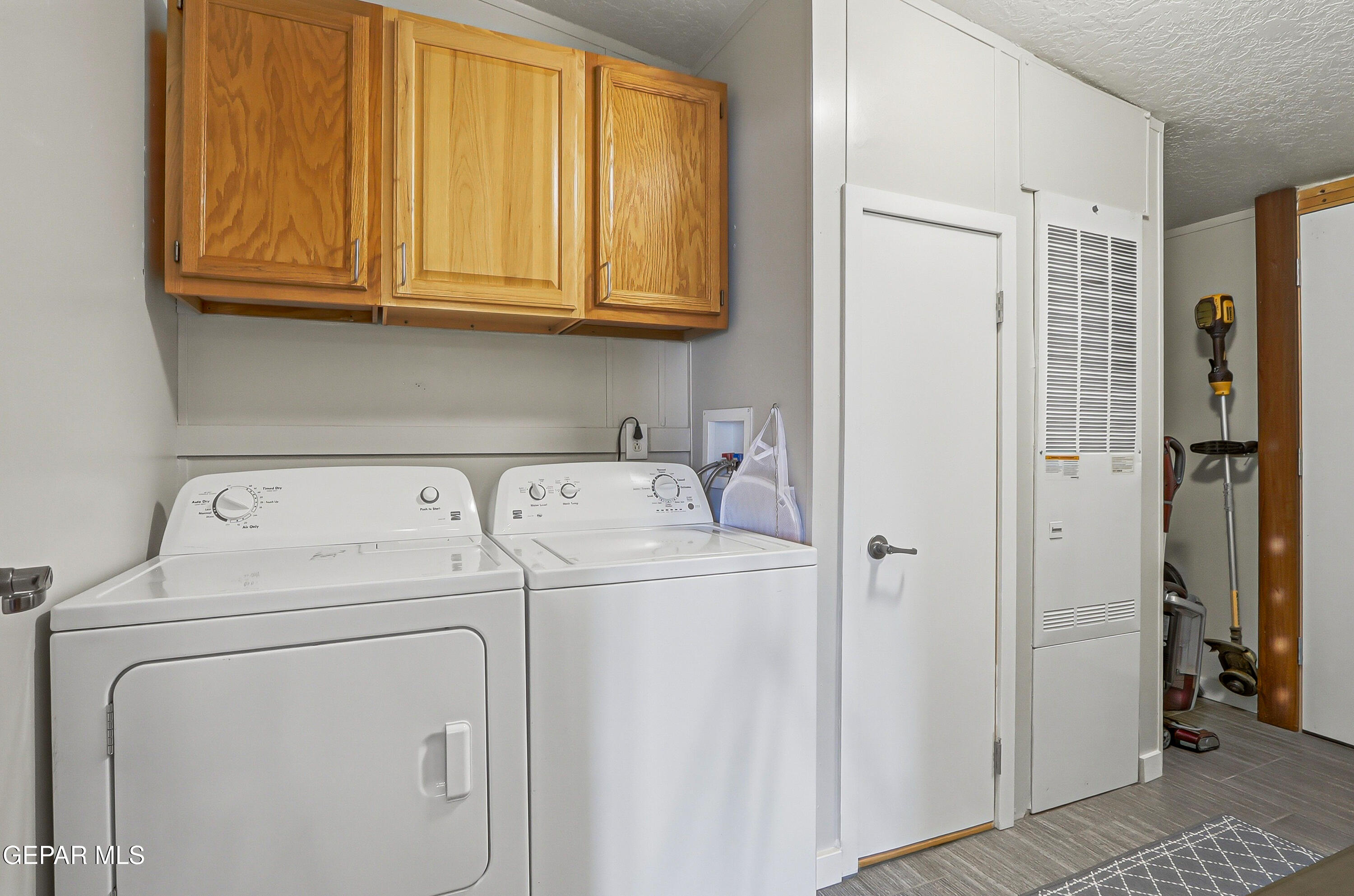 2901 Cook Street Truth or Consequences, NM 87901 - Photo 15 of 31 a utility room with dryer and washer