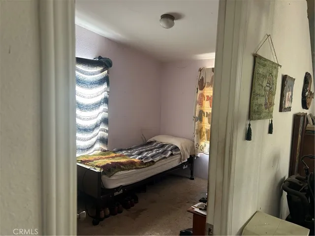 a kitchen with a sink stove and refrigerator