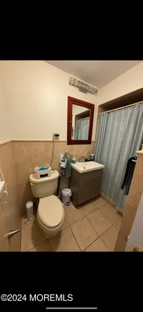 a view of a couch sitting in a living room