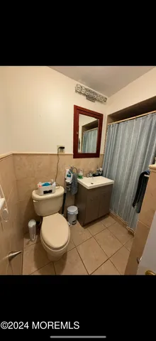 a view of a couch sitting in a living room