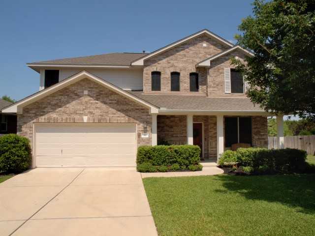 911 Linden Loop Cedar Park, TX 78613 - Photo 1 of 1 a front view of a house with garden