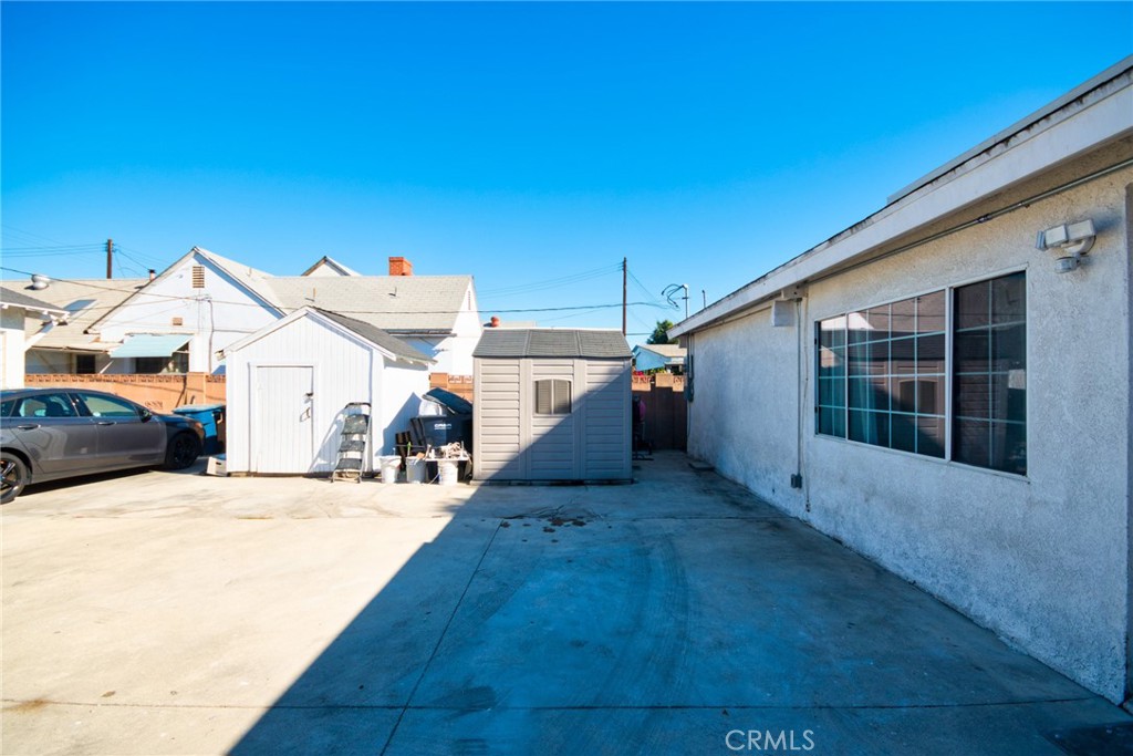 9510 1/2 Beverly Street Bellflower, CA 90706 - Photo 3 of 30 a view of a house with a yard