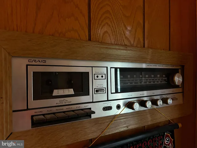 a kitchen with granite countertop a stove and a microwave