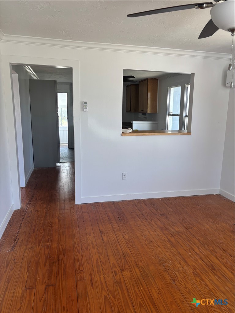 308 Poth Street Yoakum, TX 77995 - Photo 3 of 13 a view of a livingroom with wooden floor and staircase