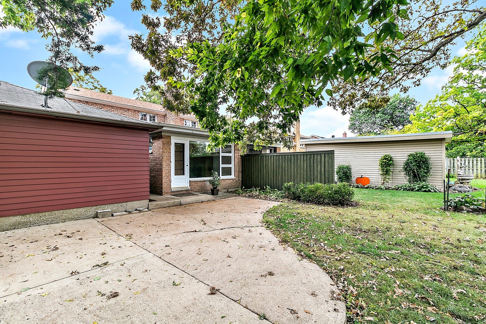8132 West 26th Street North Riverside, IL 60546 - Photo 14 of 16 a front view of a house with a yard and a garage