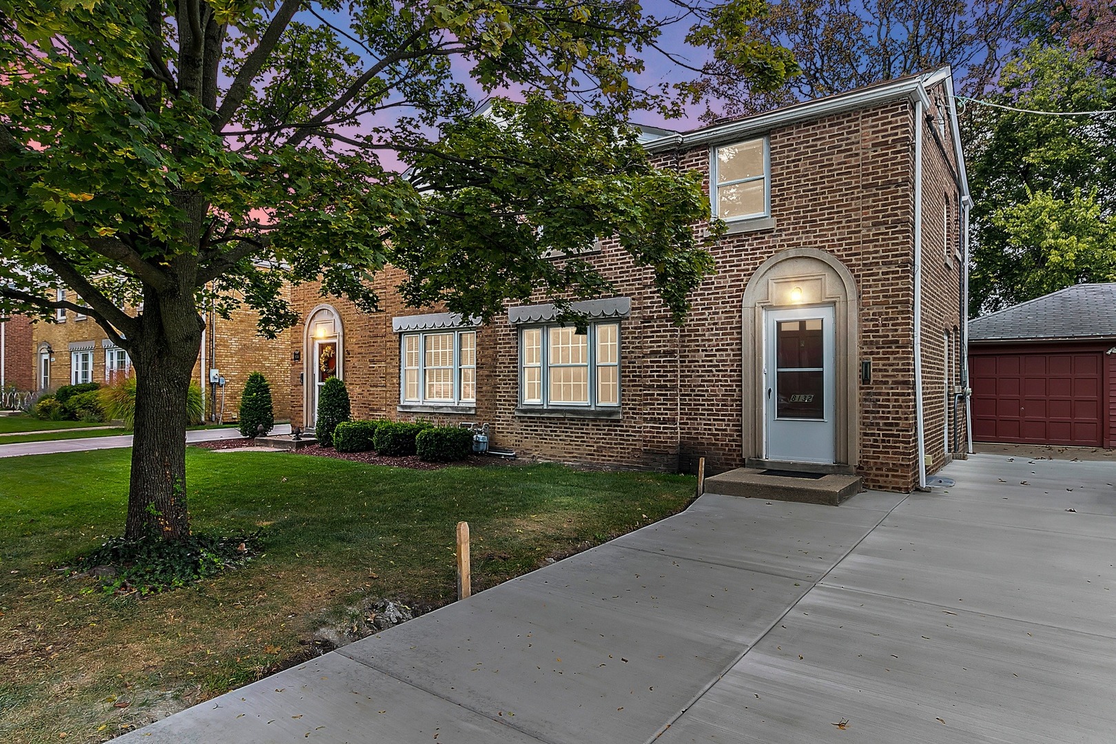 8132 West 26th Street North Riverside, IL 60546 - Photo 16 of 16 a front view of a house with a garden
