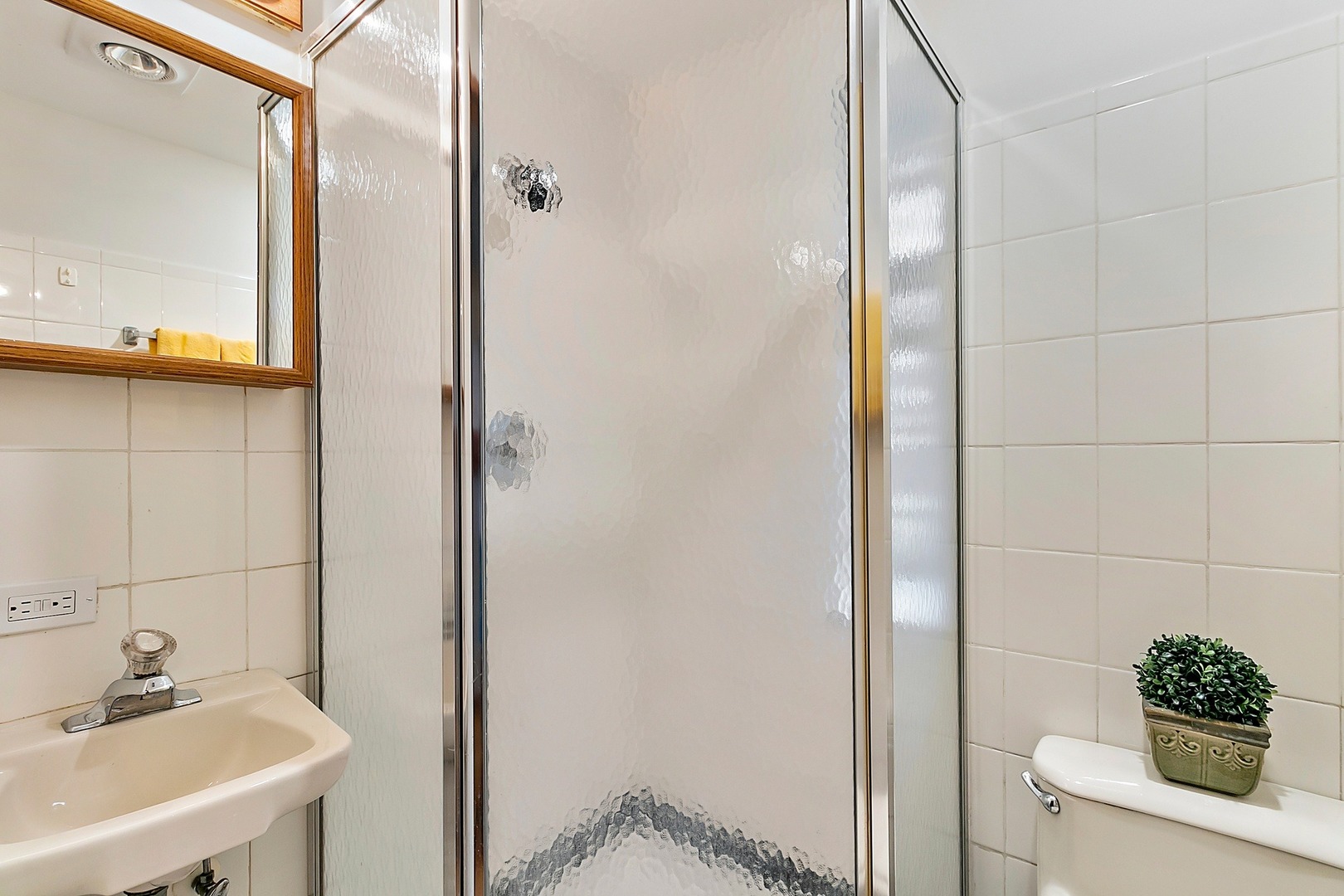 8132 West 26th Street North Riverside, IL 60546 - Photo 8 of 16 a bathroom with a sink and a mirror