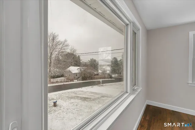 a view of a room and a window