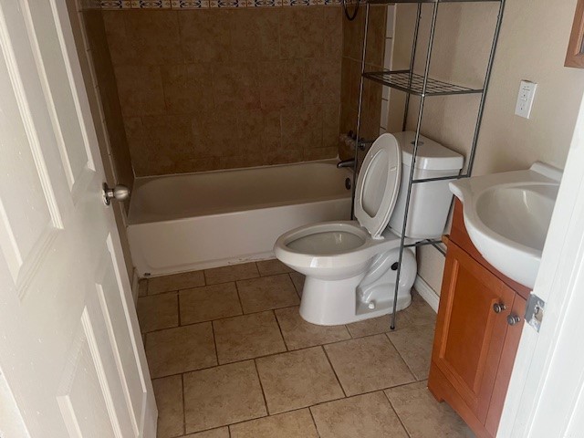 1226 North 5th Street, Unit 3 Kingsville, TX 78363 - Photo 8 of 10 a bathroom with a sink and a toilet