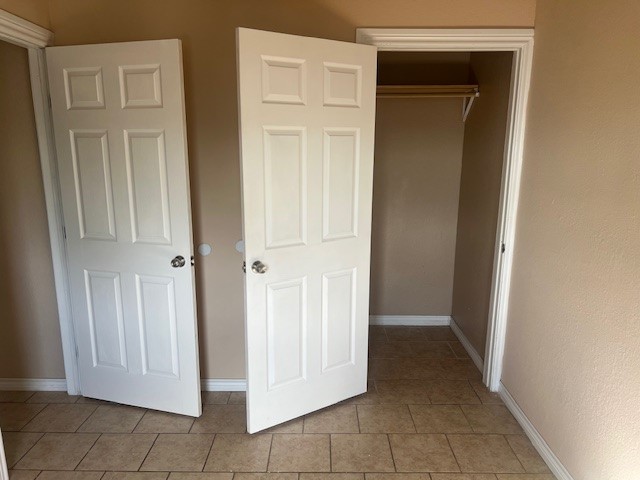 1226 North 5th Street, Unit 3 Kingsville, TX 78363 - Photo 9 of 10 a view of a hallway with front door