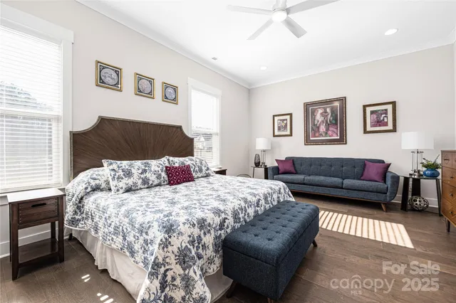 a bathroom with a granite countertop sink mirror and bathtub