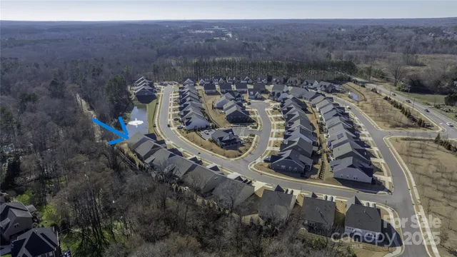 a kitchen with stainless steel appliances a sink stove and refrigerator