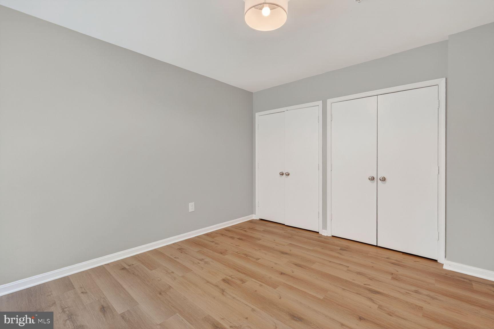 1008 Rittenhouse Street Northwest, Unit 15 Washington, DC 20011 - Photo 34 of 39 a view of empty room with wooden floor