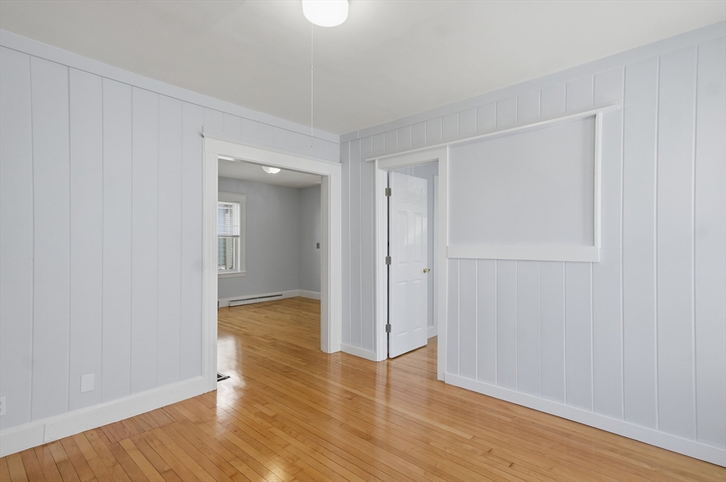 55 Addison Avenue Lynn, MA 01902 - Photo 6 of 23 a view of wooden floor in an empty room