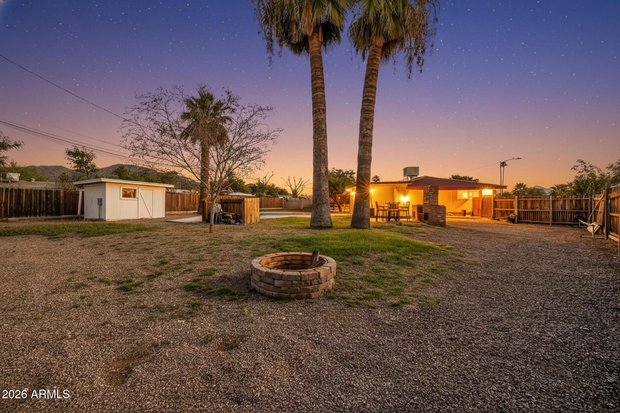 422 West Eva Street Phoenix, AZ 85021 - Photo 45 of 51 a backyard of a house with table and chairs