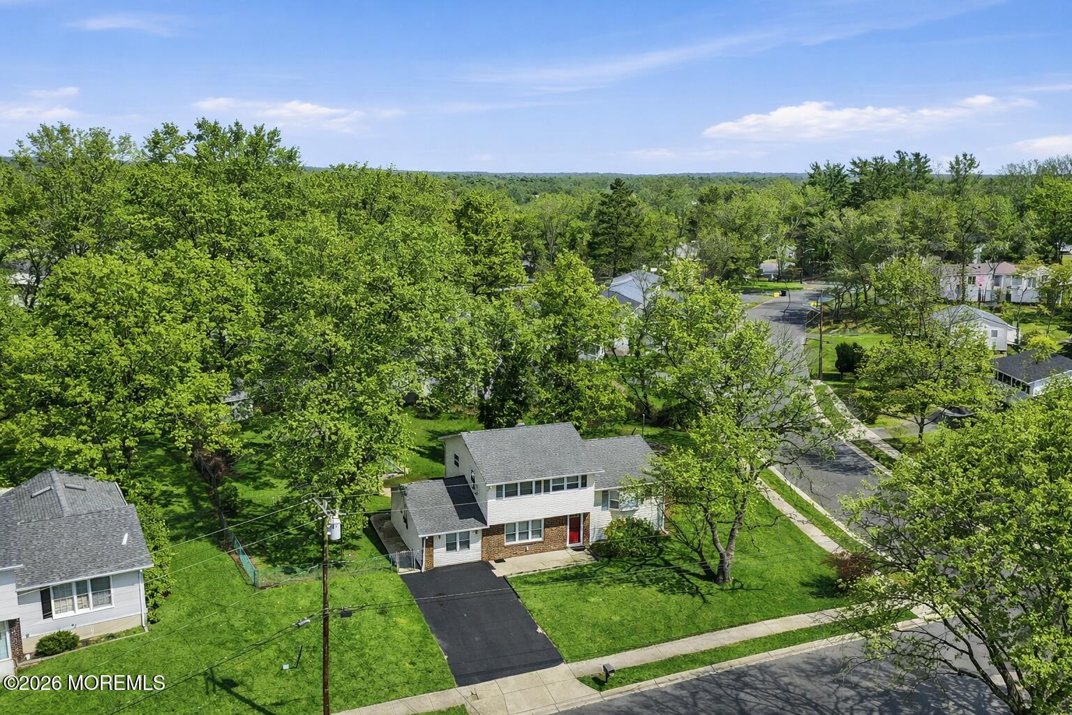 90 East Connecticut Concourse Jackson, NJ 08527 - Photo 2 of 15 an aerial view of a house with yard