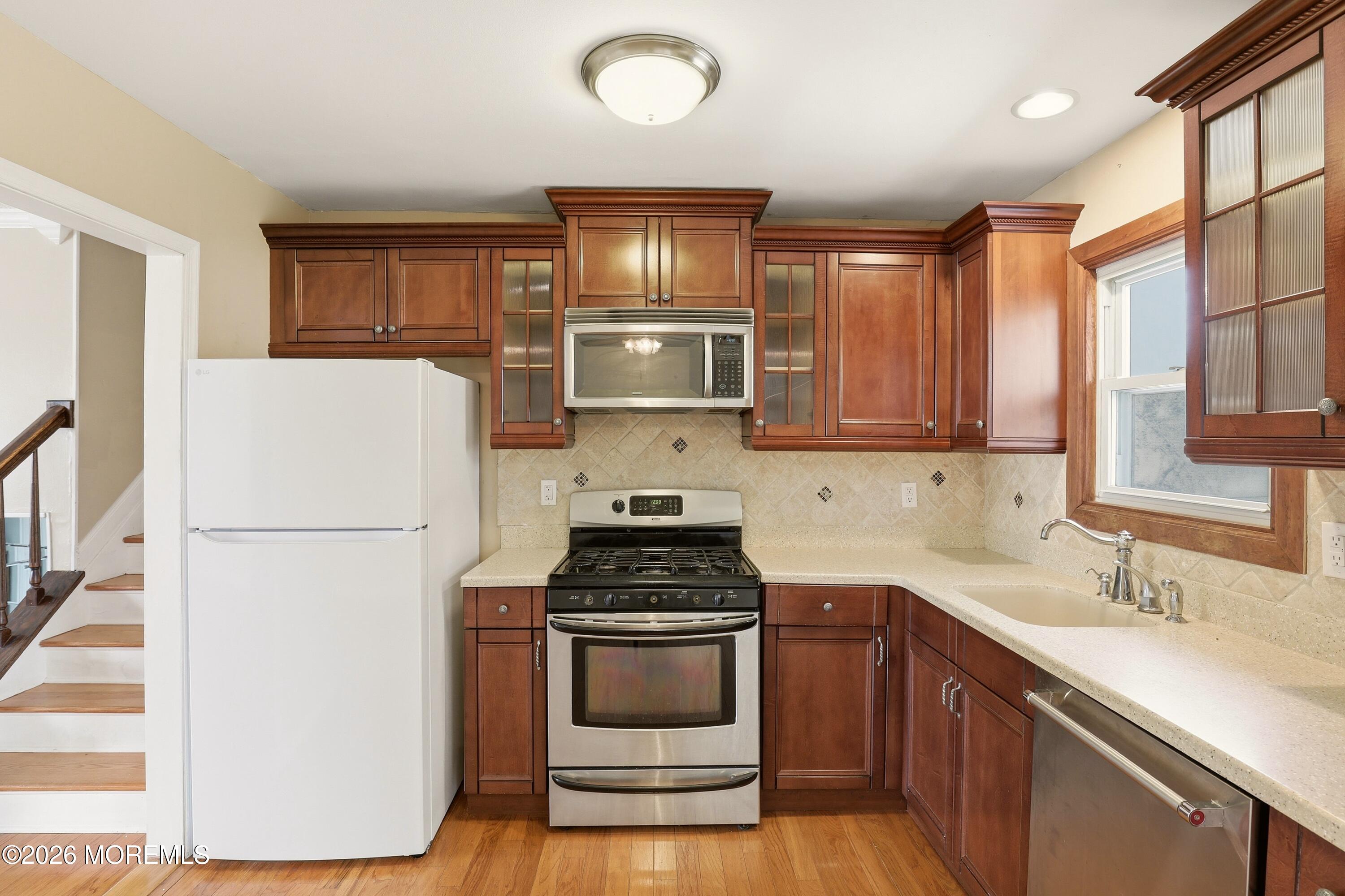 90 East Connecticut Concourse Jackson, NJ 08527 - Photo 5 of 15 a kitchen with a refrigerator stove and sink