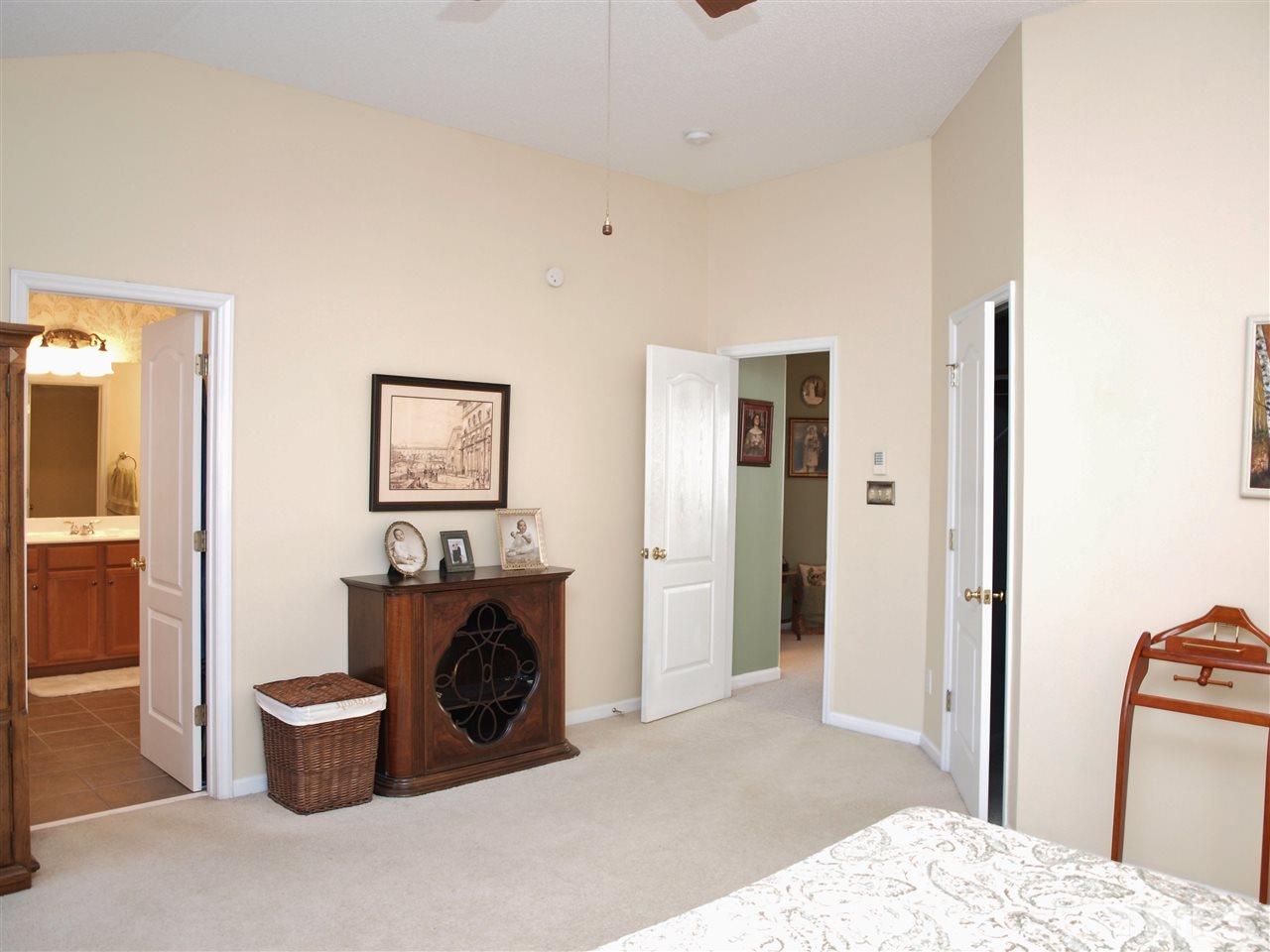 1402 Basinger Court Raleigh, NC 27612 - Photo 10 of 16 a living room with furniture and a large window