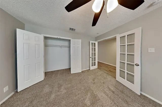 an empty room with a empty space and a window