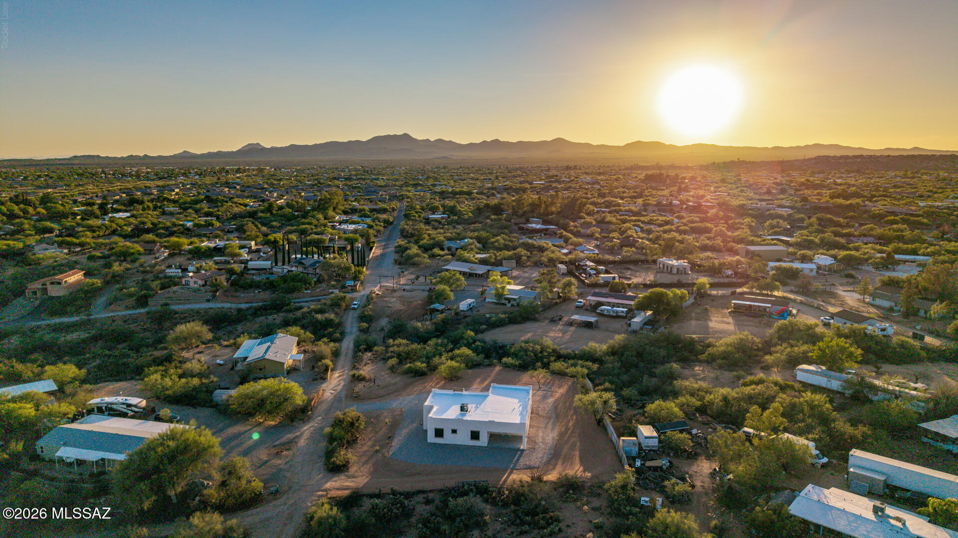 4601 East Magoo Road Tucson, AZ 85739 - Photo 27 of 38 an aerial view of residential house with parking space