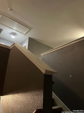 a room with furniture and window