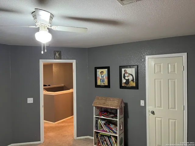 a bedroom with bed and a window