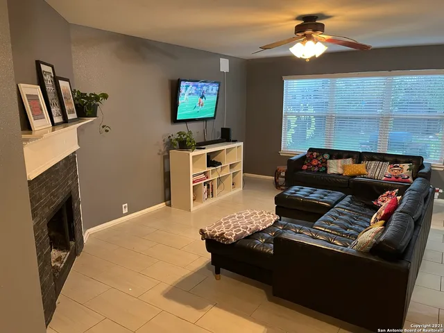 a kitchen with stainless steel appliances a stove refrigerator sink and microwave