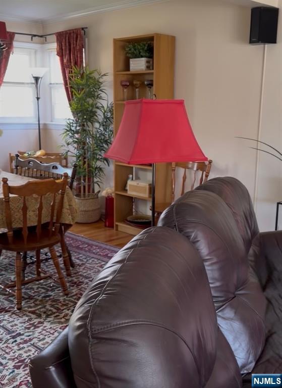 249 Madison Avenue Cresskill, NJ 07626 - Photo 18 of 26 a bed sitting in a bedroom next to a window with potted plants