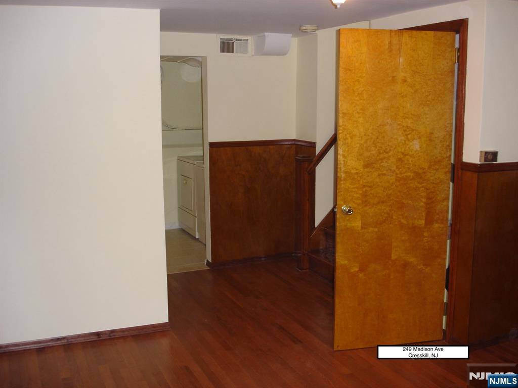 249 Madison Avenue Cresskill, NJ 07626 - Photo 23 of 26 an entryway door with wooden floor