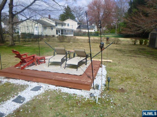 249 Madison Avenue Cresskill, NJ 07626 - Photo 5 of 26 a view of a bench in the patio