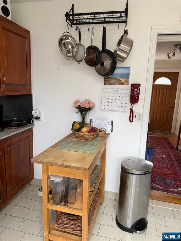 249 Madison Avenue Cresskill, NJ 07626 - Photo 10 of 26 a kitchen with a stove and cabinets
