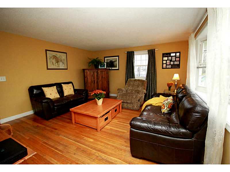 313 Middle Road Portsmouth, RI 02871 - Photo 3 of 15 Den/Family/Great Room. Family room with hardwood flooring