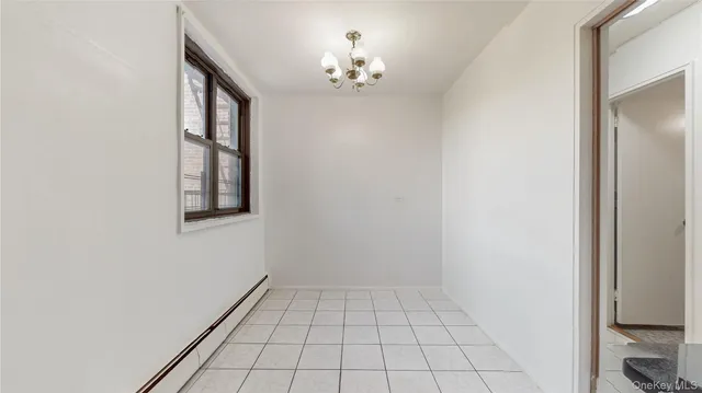 a kitchen with a stove and a refrigerator