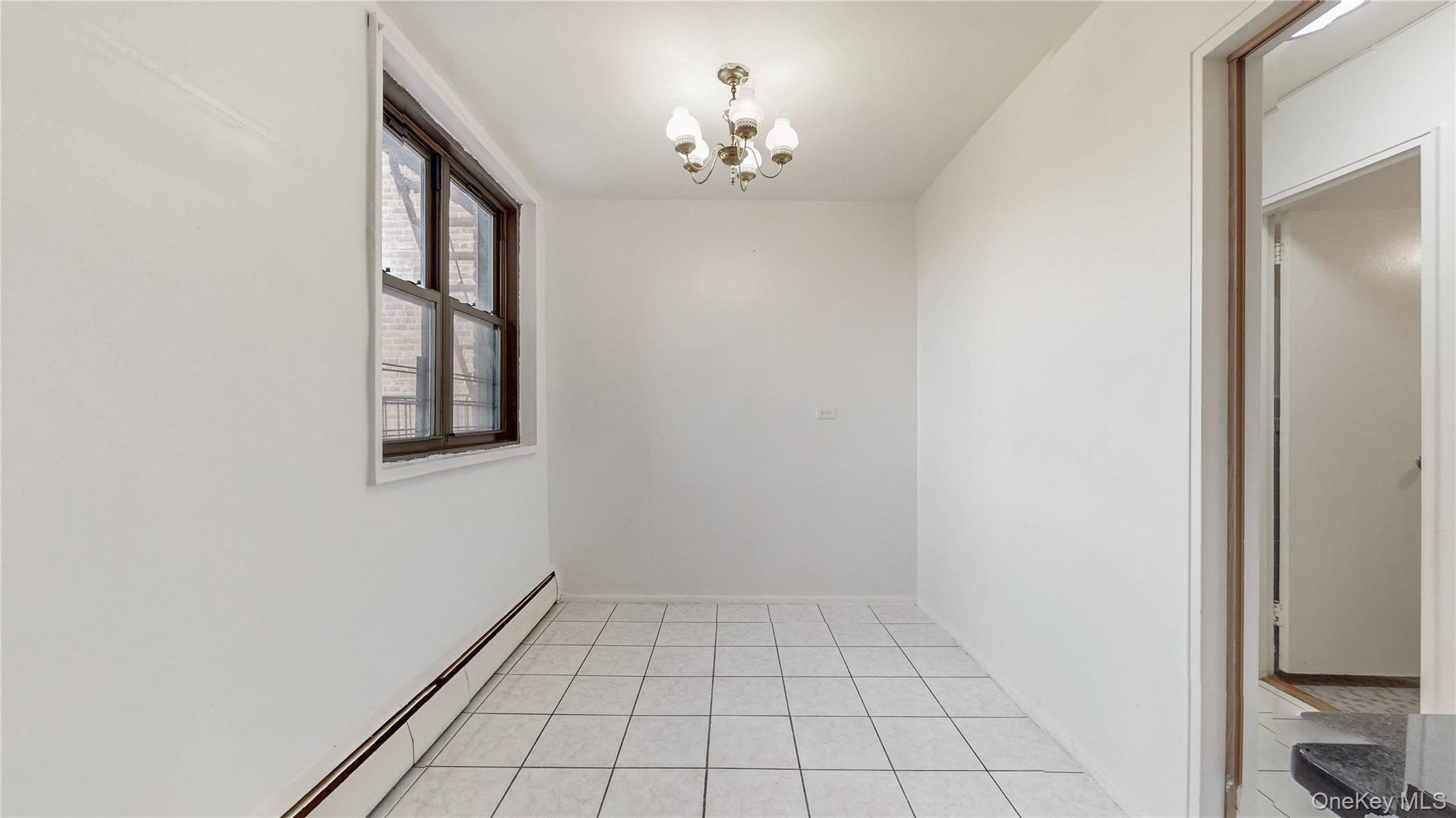 99-35 59th Avenue, Unit 4E Queens, NY 11368 - Photo 11 of 22 Eat in Kitchen Area