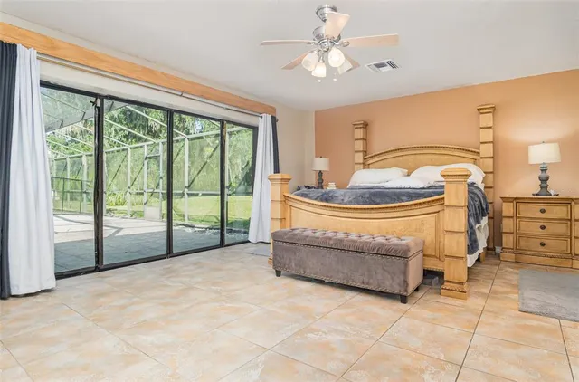 a view of a livingroom with furniture and a flat screen tv