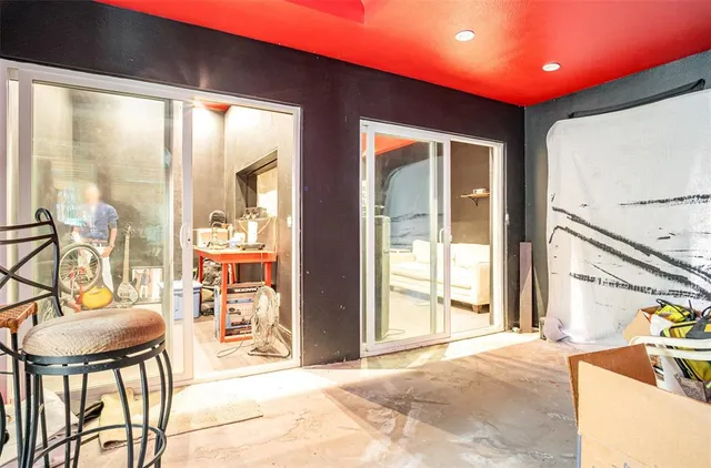 a view of a house with a yard and garage