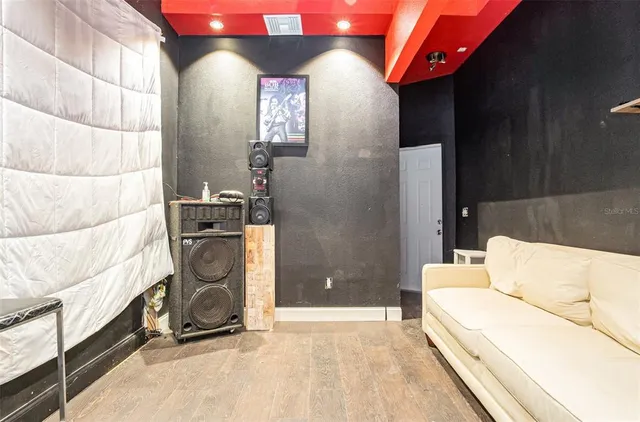 a view of a house with a backyard and a space