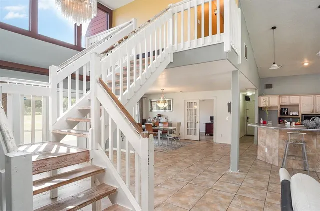 a view of entryway and hall with dining room