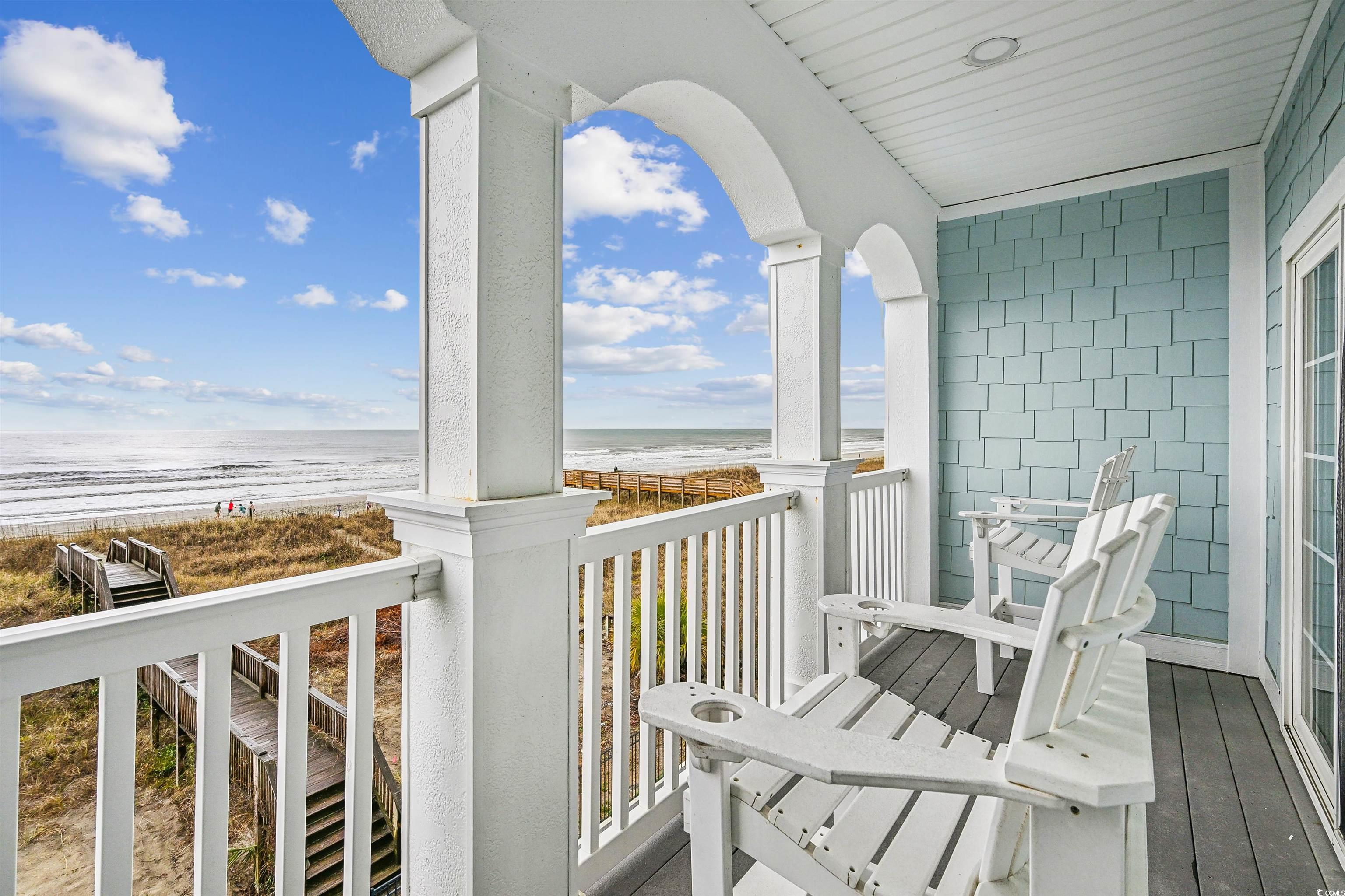 931 South Ocean Boulevard North Myrtle Beach, SC 29582 - Photo 19 of 40 Balcony with view of water and beach