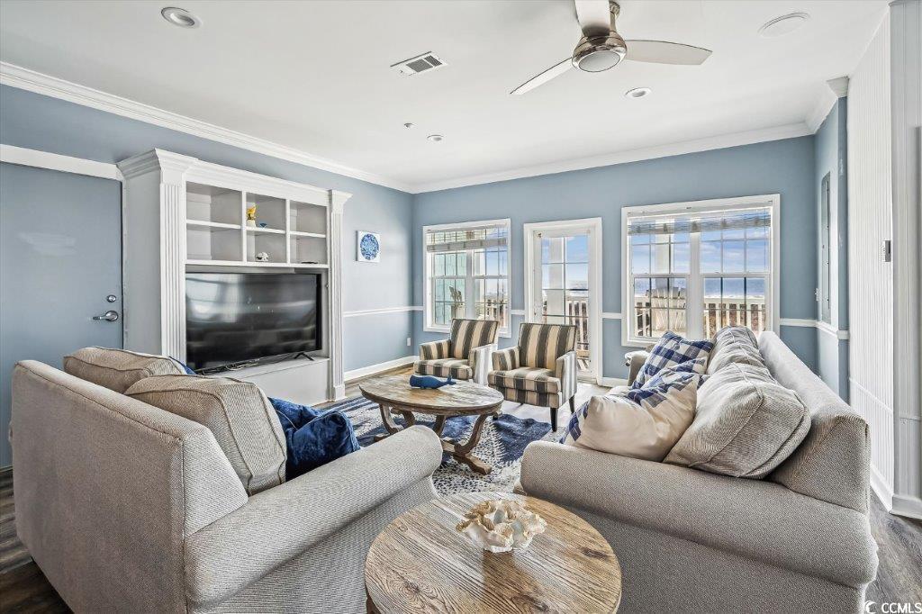 931 South Ocean Boulevard North Myrtle Beach, SC 29582 - Photo 7 of 40 Living area with ornamental molding, ceiling fan, recessed lighting, and wood finished floors