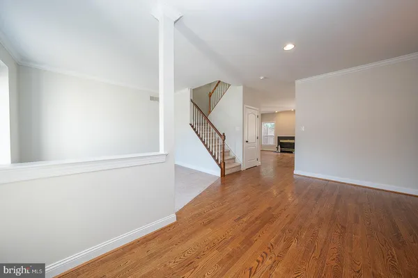 a view of entryway with wooden floor