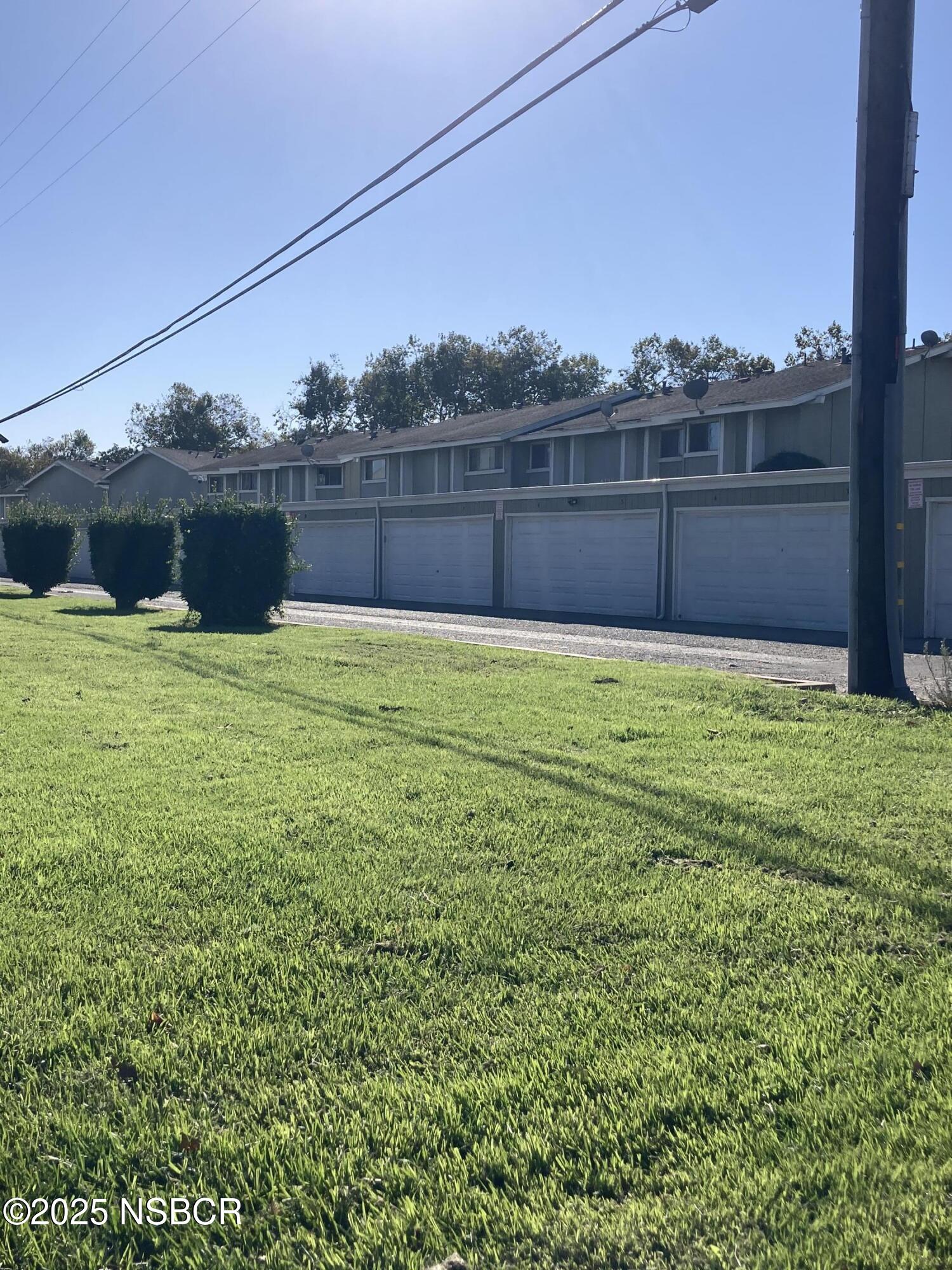413 East Park Avenue, Unit C3 Santa Maria, CA 93454 - Photo 3 of 26 a view of a yard with an outdoor seating