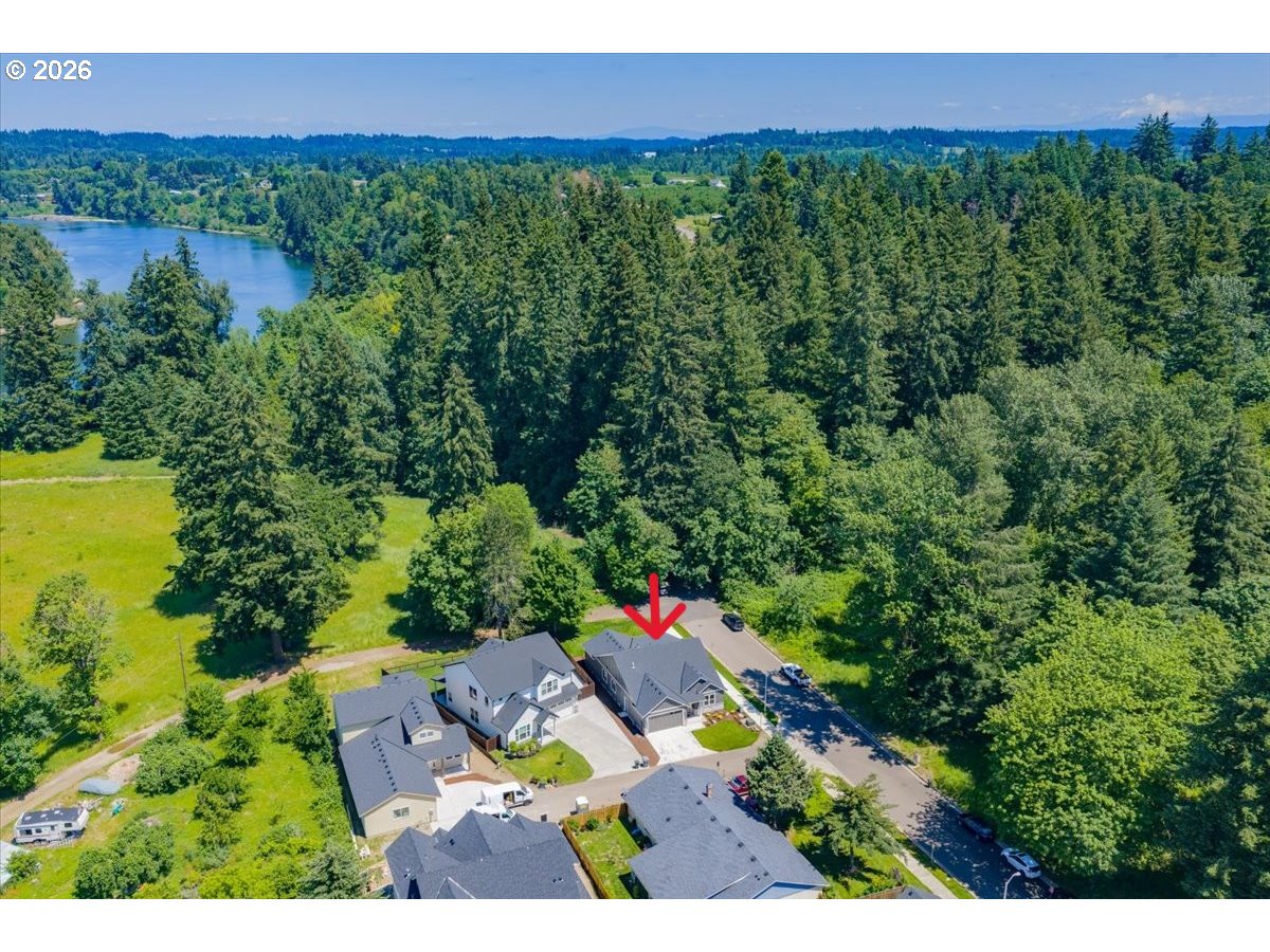 2147 Northeast Spitz Road Canby, OR 97013 - Photo 46 of 48 a view of a yard with a large tree and a yard