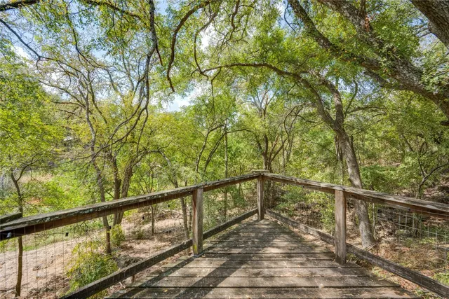 a view of balcony with two trees