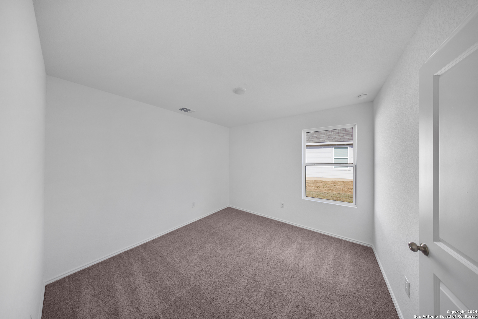 13611 Appleton Way San Antonio, TX 78253 - Photo 8 of 12 a view of an empty room with a window